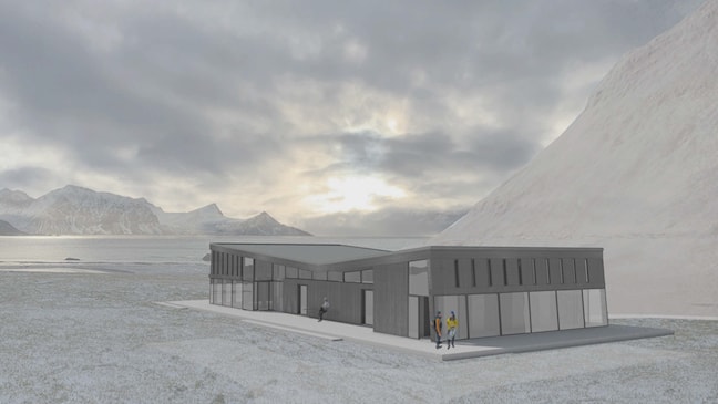 Café and service building, parking and trails, surrounded by mountains and sea.
